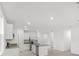 Modern kitchen with island and stainless steel appliances at 2482 Leeds St, Haines City, FL 33844