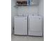 Laundry room with washer and dryer, and shelving at 190 Mandovi St, Davenport, FL 33837