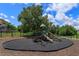 Community playground with playset and safety surface at 190 Mandovi St, Davenport, FL 33837