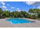 Community swimming pool with spacious deck area at 190 Mandovi St, Davenport, FL 33837