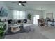 Spacious living room with an open floor plan and a dining area at 190 Mandovi St, Davenport, FL 33837
