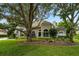 Exterior of charming two-story home with landscaping at 1560 Eagle Nest Cir, Winter Springs, FL 32708