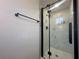 Modern bathroom with a frameless glass shower and marble tile at 111 Lake Dot Dr, Sanford, FL 32773