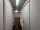 Bright hallway with doors leading to other rooms at 111 Lake Dot Dr, Sanford, FL 32773