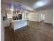 Modern kitchen with white cabinets and a large island at 111 Lake Dot Dr, Sanford, FL 32773