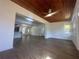 Open living room with wood-look floors and a wood ceiling at 111 Lake Dot Dr, Sanford, FL 32773