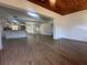Open concept living area with hardwood floors, wood ceiling and recessed lighting at 111 Lake Dot Dr, Sanford, FL 32773