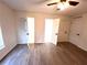 Bright bedroom with two closets and wood-look flooring at 366 Fairfield Dr, Sanford, FL 32771
