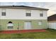Two-story home with red patio and fenced backyard at 366 Fairfield Dr, Sanford, FL 32771