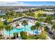 Resort-style pool with palm trees and lounge areas at 8851 Sperry St, Orlando, FL 32827
