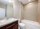 Bathroom featuring a tub, toilet and vanity at 8851 Sperry St, Orlando, FL 32827
