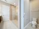 Bathroom with shower, toilet, and double vanity at 8851 Sperry St, Orlando, FL 32827