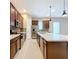Modern kitchen with stainless steel appliances and an island at 8851 Sperry St, Orlando, FL 32827