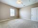 Simple bedroom with carpet and window at 8851 Sperry St, Orlando, FL 32827