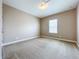 Well-lit bedroom with carpet and window at 8851 Sperry St, Orlando, FL 32827
