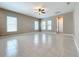 Bright living room featuring tile floors and neutral walls at 8851 Sperry St, Orlando, FL 32827