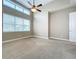 Spacious bedroom with high ceilings and two windows at 8851 Sperry St, Orlando, FL 32827