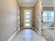 Bright and airy entryway with tile flooring and access to other rooms at 8851 Sperry St, Orlando, FL 32827