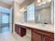 Double vanity bathroom with quartz countertop at 8851 Sperry St, Orlando, FL 32827