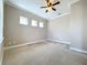 Bright bedroom with carpeted floor and multiple windows at 8851 Sperry St, Orlando, FL 32827