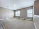 Bright bedroom featuring neutral walls and carpet at 8851 Sperry St, Orlando, FL 32827