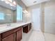 Bathroom with double vanity and large walk-in shower at 8851 Sperry St, Orlando, FL 32827