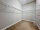 Large walk-in closet with wire shelving and rods at 8851 Sperry St, Orlando, FL 32827