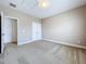 Bedroom with access to another room and double doors at 8851 Sperry St, Orlando, FL 32827