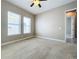 Bright bedroom with carpeted floors and ceiling fan at 8851 Sperry St, Orlando, FL 32827