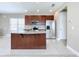 Kitchen island with granite countertops and stainless steel appliances at 8851 Sperry St, Orlando, FL 32827