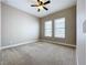 Bright bedroom with neutral walls and carpet flooring at 8851 Sperry St, Orlando, FL 32827