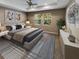 Main bedroom with carpet flooring and two windows at 3402 Sagebrush St, Harmony, FL 34773