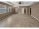 Spacious living room with tile flooring and neutral wall colors at 3402 Sagebrush St, Harmony, FL 34773