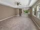 Open living room and kitchen area with tile flooring at 3402 Sagebrush St, Harmony, FL 34773