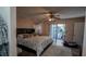 Bedroom with king-size bed and access to patio at 1281 Eastland Pt, Longwood, FL 32750