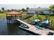 Wooden kayak dock with various kayaks and canoes at 4721 Clock Tower Dr # 108, Kissimmee, FL 34746