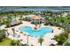 Relaxing freeform pool with lounge chairs at 4721 Clock Tower Dr # 108, Kissimmee, FL 34746