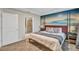 Large main bedroom with mountain mural and en-suite bathroom at 4721 Clock Tower Dr # 108, Kissimmee, FL 34746