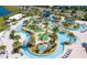 Aerial view of a community lazy river, water slides, and mini golf course at 4721 Clock Tower Dr # 108, Kissimmee, FL 34746