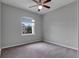 Bright bedroom with neutral walls, carpet flooring, and ceiling fan at 2286 Chatham Place Dr, Orlando, FL 32824