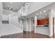 Modern staircase with hardwood floors and white railing at 2286 Chatham Place Dr, Orlando, FL 32824