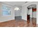 Spacious dining room with hardwood floors and chandelier at 2286 Chatham Place Dr, Orlando, FL 32824