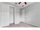 Spacious bedroom with neutral walls, carpet flooring, and ceiling fan at 2286 Chatham Place Dr, Orlando, FL 32824