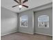 Bright bedroom with neutral walls, carpet flooring, and ceiling fan at 2286 Chatham Place Dr, Orlando, FL 32824