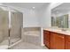 Bathroom with corner shower and garden tub at 2286 Chatham Place Dr, Orlando, FL 32824