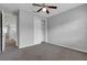 Spacious bedroom with neutral walls, carpet flooring, and ceiling fan at 2286 Chatham Place Dr, Orlando, FL 32824