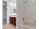 Bathroom with double vanity and a shower/tub combo at 2286 Chatham Place Dr, Orlando, FL 32824