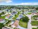 Aerial view of neighborhood showcasing homes and green spaces at 5634 Loma Vista Ct, Davenport, FL 33896