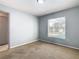 Bright bedroom with window and double door closet at 5634 Loma Vista Ct, Davenport, FL 33896