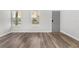 Bright living room with hardwood floors and neutral-toned walls at 701 N Grandview Ave, Daytona Beach, FL 32118